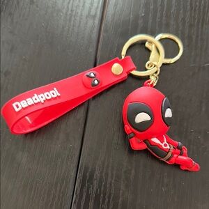 Marvel Deadpool lying down silicone keychain